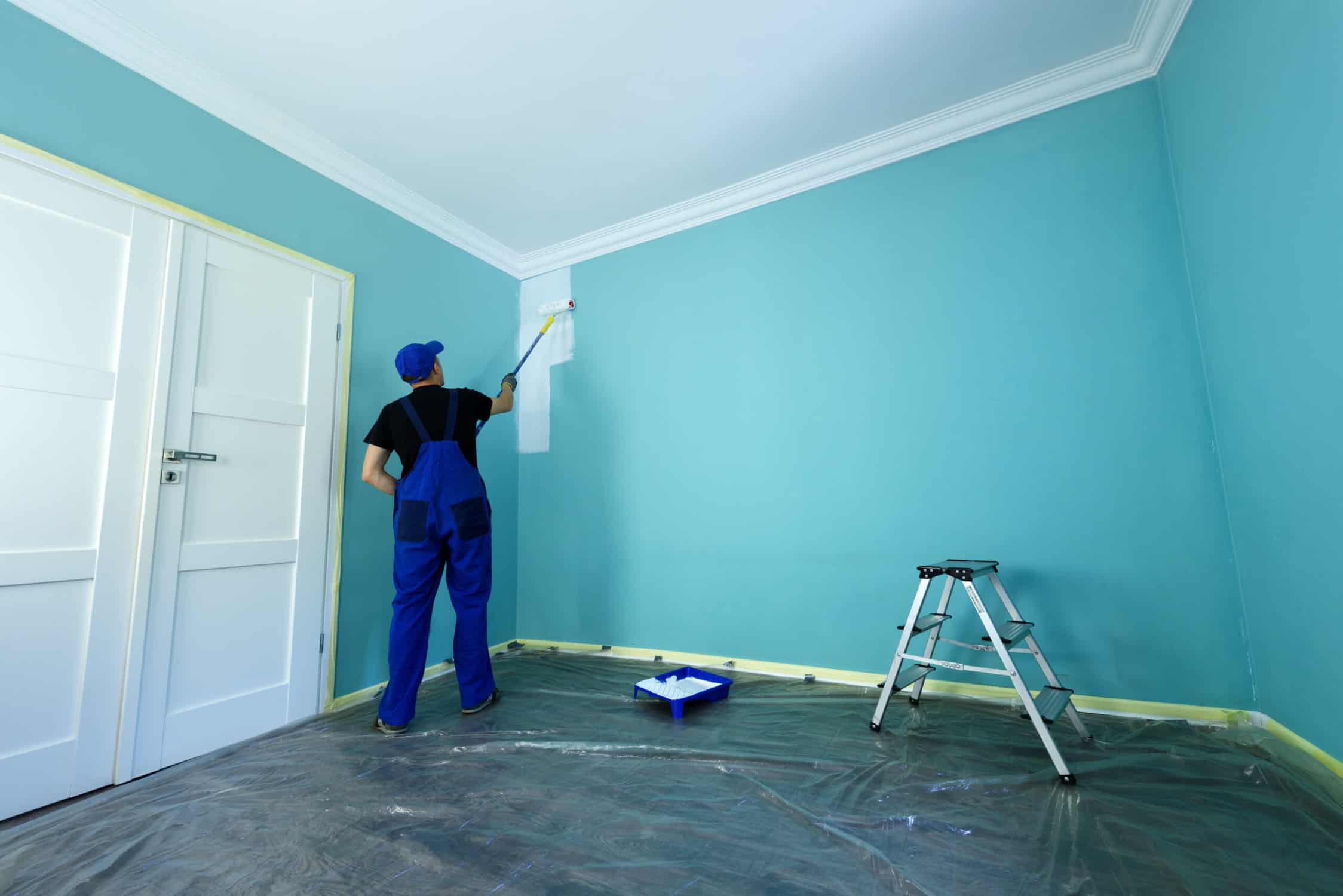 Man in a working overall Lead-Based Paint Wisconsin Homes