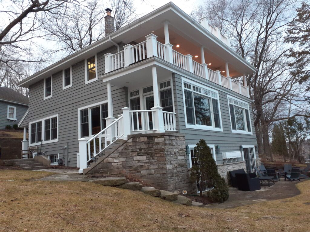 Large gray house with white accent