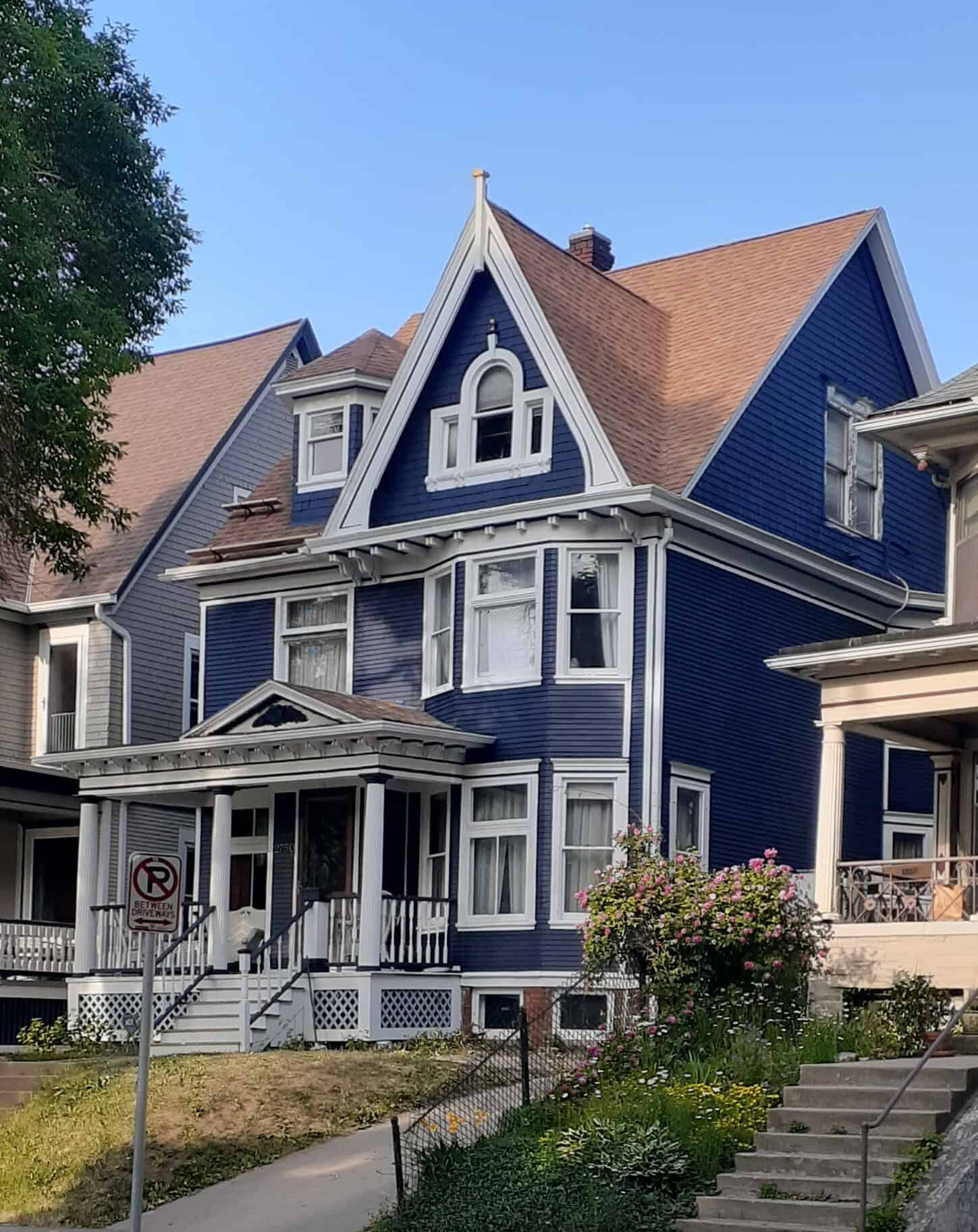 Large blue house with white trim