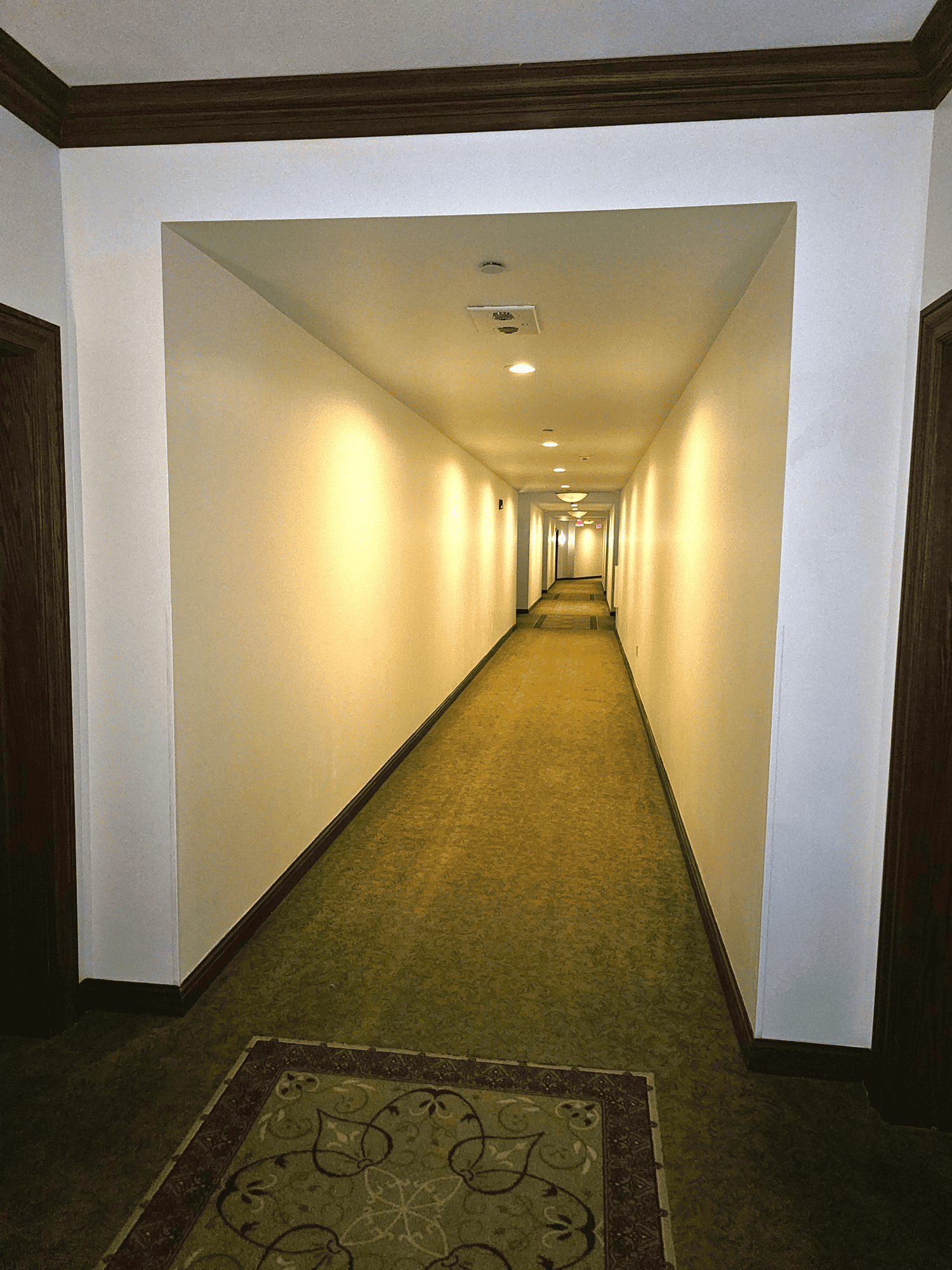 White corridor with warm lighting