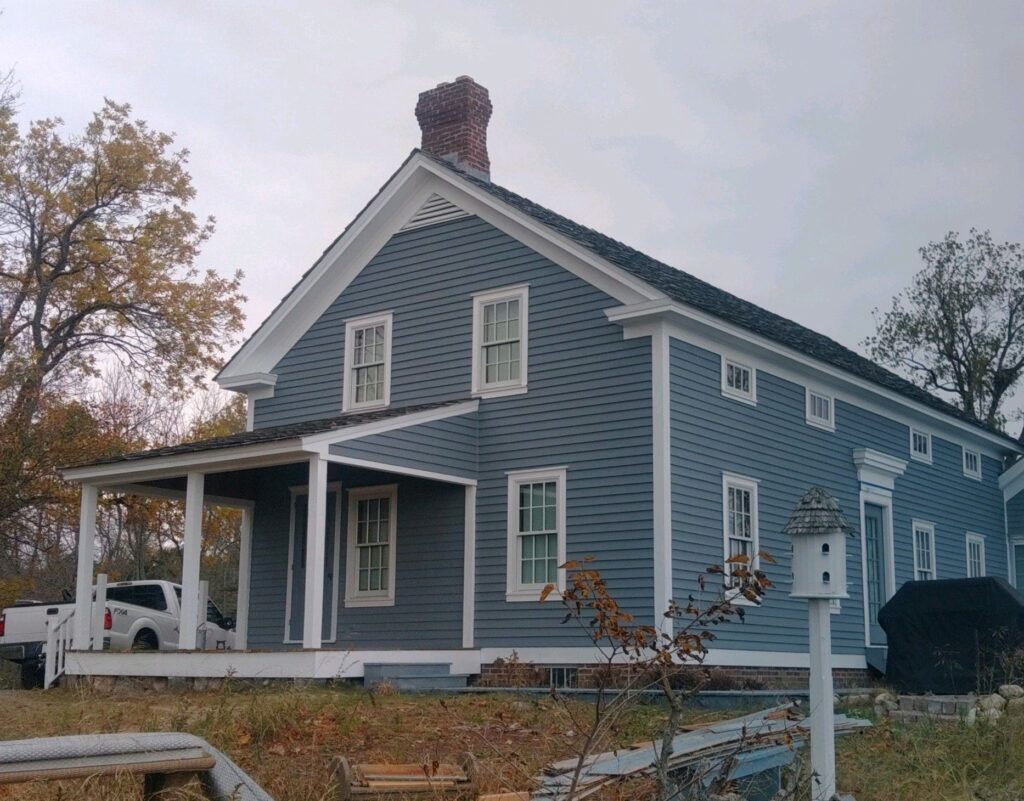 Blue house after picture