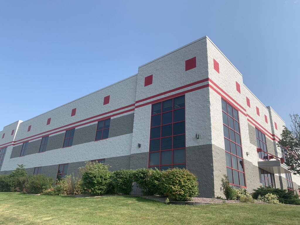 Modern commercial building with red accents