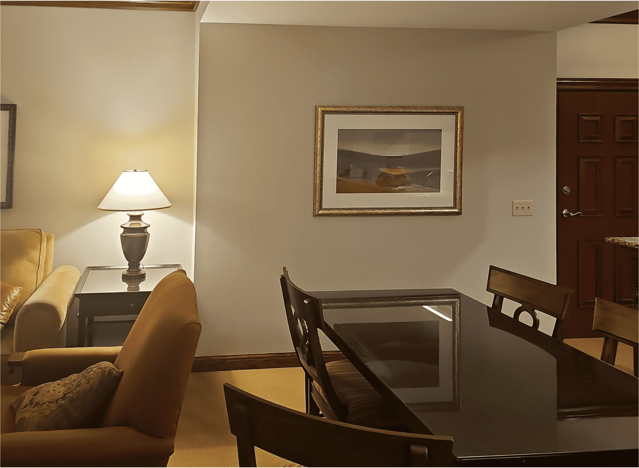 Minimalist dining room with warm lighting